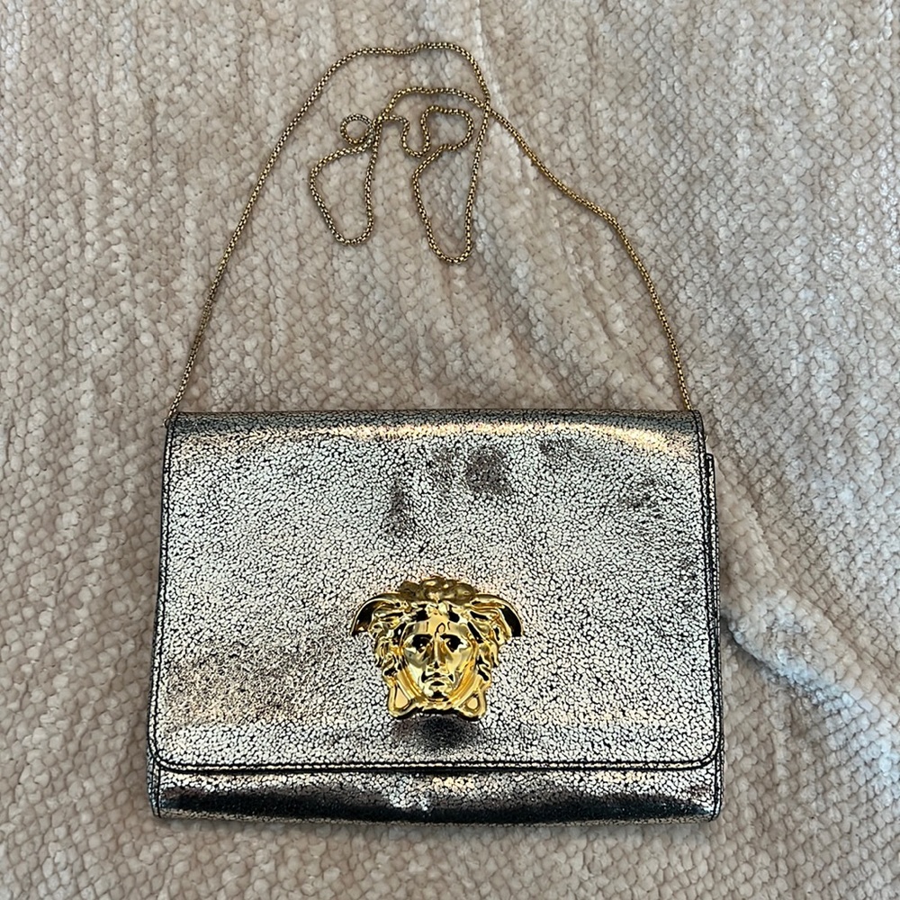 Gold Versace clutch with chain